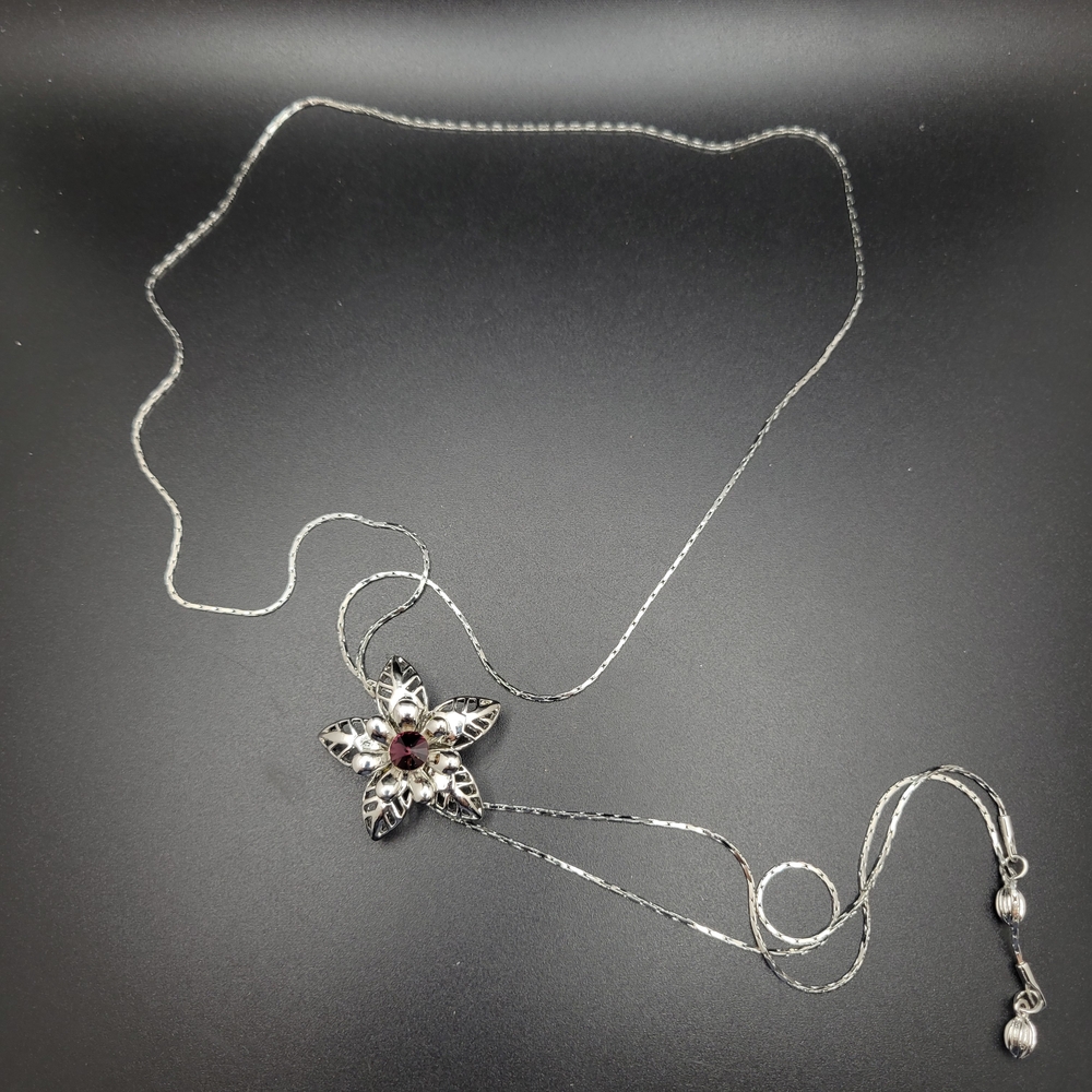 Silver Floral Pendant Necklace with Garnet Accent
